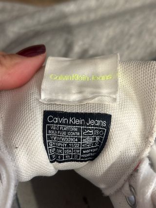 Zapatillas Calvin Klein Blancas con franja amarill