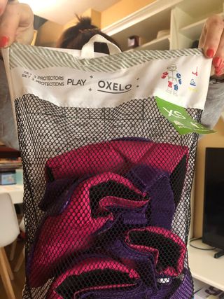 Casco y protecciones Decathlon con mochila