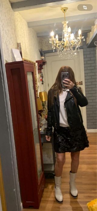 Falda Stradivarius lentejuelas negra T. L