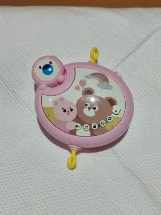 Móvil cuna musical y proyector