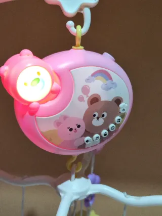 Móvil cuna musical y proyector