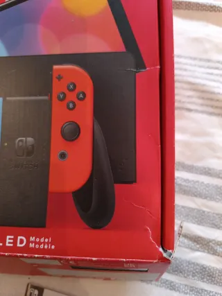 Caja y manual Nintendo Switch OLED