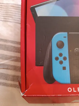 Caja y manual Nintendo Switch OLED