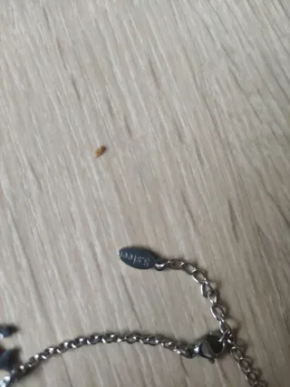 Tobillera plateada con colgantes marinos