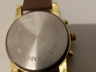 Reloj Zeal Dorado y Morado