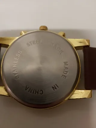 Reloj Zeal Dorado y Morado