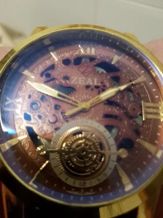 Reloj Zeal Dorado y Morado