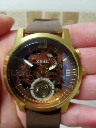 Reloj Zeal Dorado y Morado