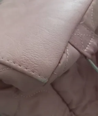 Mochila pequeña acolchada rosa