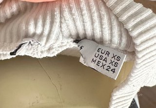 Jersey cuello alto blanco Bershka