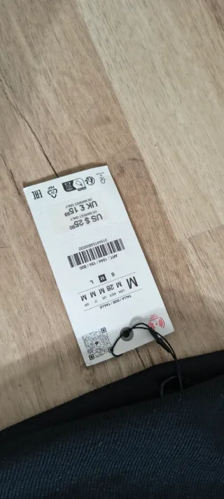 Top Zara talla M asimétrico y con un lateral drape