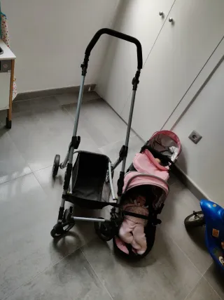 Carrito gemelar para muñecas rosa