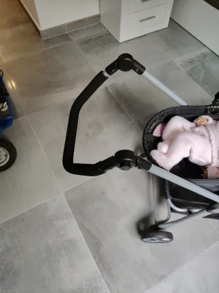 Carrito gemelar para muñecas rosa