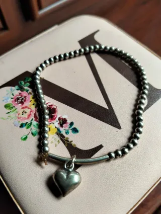 Pulsera plata con charm corazón