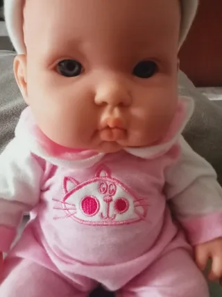 Muñeca bebé de peluche rosa P. Uxigar Onil