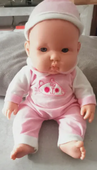 Muñeca bebé de peluche rosa P. Uxigar Onil