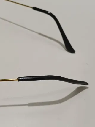 Gafas redondas retro doradas amarillas