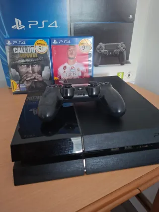 PS4 500GB + 2 Juegos y mando.