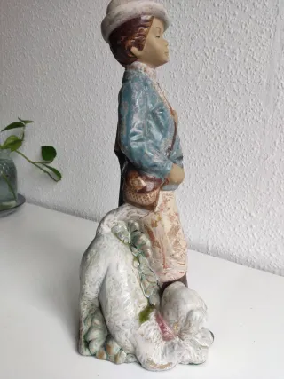 Figura porcelana cazador con perro