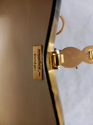 Bolso de fiesta clutch negro y dorado