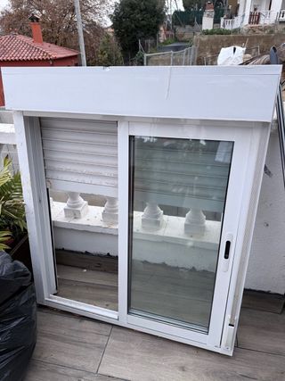 Ventana corredera con persiana.un metro por metro