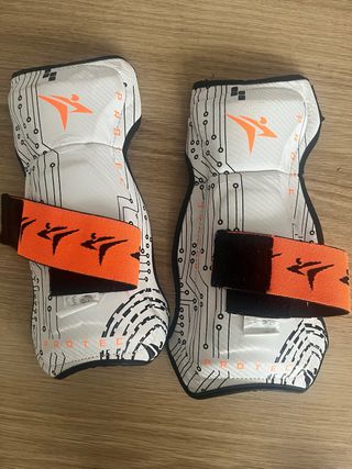 Espinilleras Protec Naranja y Blanco