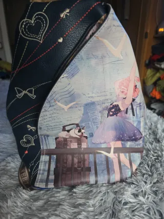 Bolso azul y blanco con estampado , mochila