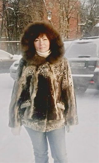 Abrigo de piel natural con capucha