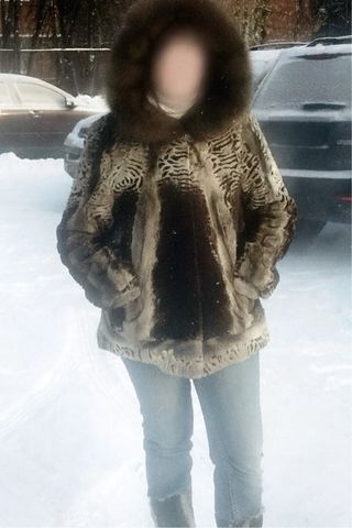 Abrigo de piel natural con capucha