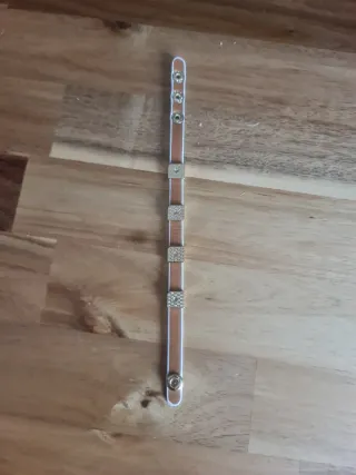 Pulsera CH Carolina Herrera Blanca y Dorada