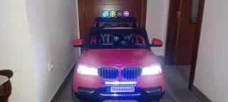 Coche eléctrico infantil rojo