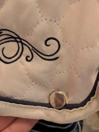 Carrito bebé reborn blanco y azul Arenas