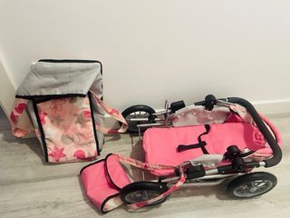 Carrito de juguete para muñecas rosa