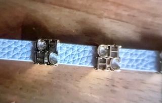 Pulsera CH Carolina Herrera dorada Blanco