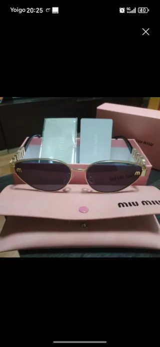 Gafas de sol Miu Miu doradas y rosas