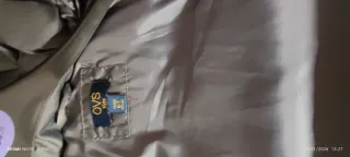 Piumino bambina grigio con cintura