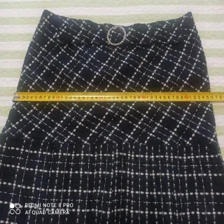 Falda cuadros plisada con flecos