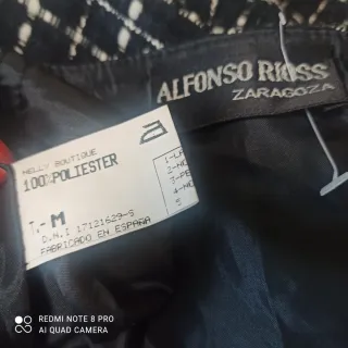 Falda cuadros plisada con flecos