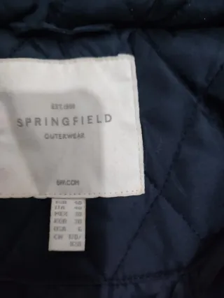 Cazadora acolchada azul marino