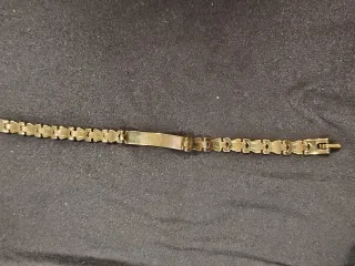 Esclava Laminada en oro con placa central.