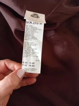 Abrigo de paño de calidad.