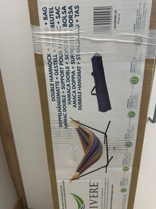 Hamaca de tela multicolor con soporte sin estrenar