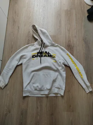 Sudadera blanca con letras REAL DREAMS