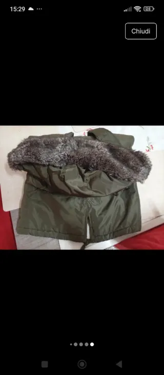 Piumino verde sotto ginocchio 8 anni