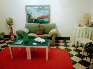 Sofá de 2 plazas de terciopelo verde