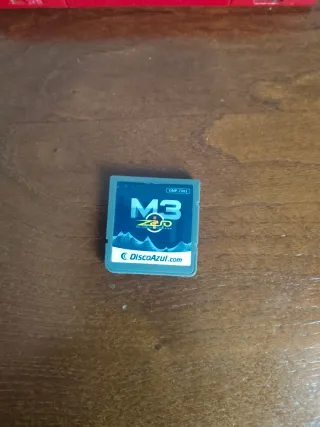 Nintendo DS y regalo la de color rojo