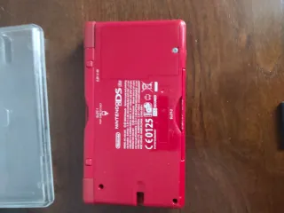 Nintendo DS y regalo la de color rojo