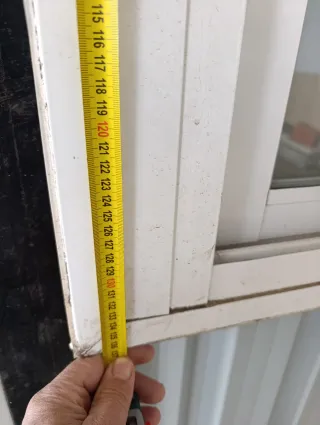 Ventana aluminio con persiana con reja