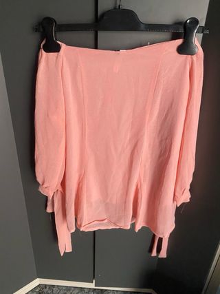 Blusón rosa con detalles brillantes