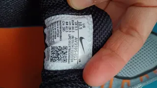 Zapatillas Nike Shox grises y naranjas